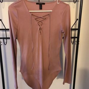 Pink cross cut body suit